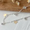 Silver chain with gold and silver butterfly charms and small round bells for DIY decor - Silver Butterfly Style
