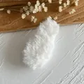 Plush white faux fur oval patch for DIY crafts with a soft texture and fluffy finish - White Rabbit Ears