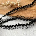 Elegant black pleated mesh lace trim with ruffled edges and floral embroidery detail - Single Sided Ruffled Style / Black