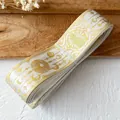 White ribbon featuring gold foil moon and star celestial patterns for DIY crafting - Standard Roll / White With Gold Star Moon