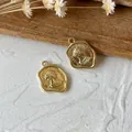 Irregular vintage gold coin pendant featuring Elizabeth II relief for DIY jewelry making - Elizabeth II Coin Pendant / Gold