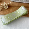 Light green grosgrain ribbon with silver laser star and moon patterns for DIY crafts - Extended Roll / Fruit Green With Silver Holographic