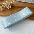 Light blue ribbon with holographic laser star and moon patterns for DIY crafting - Extended Roll / Light Blue With Silver Holographic