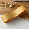 Orange gold ribbon with metallic gold magic star patterns for DIY bow making - Orange-colored Gold-plated "magic Bottle" 4.5 Meters Long And Approximately 2.5 Cm Wide