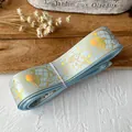 Hellblaues Verlaufsband mit Silberfolien-Pokerkaninchen für DIY-Bastelarbeiten - Hellblau Gold