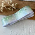 Green gradient ribbon roll with silver holographic star patterns for DIY crafts - A Plain Silver "magic Vase" In A Tea-green Hue Measuring 4.5 Meters Long And Approximately 2.5 Centimeters Wide.