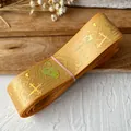 Goldenes Satinband mit heißgeprägten Pokerkarnickel und Kreuzmotiven für DIY-Bastel - Orange Bronzing