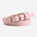 Slim pink leather belt for women featuring a gold oval metal buckle with adjustable holes - Light Pink