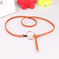 Slim braided brown leather belt for women with a polished gold circular metal buckle - Camel