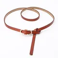 Caramel brown slim leather belt for women with golden double ring buckle and knot detail - Camel