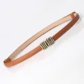 Slim brown leather fashion belt for women featuring a stylish gold multi-ring buckle - Camel