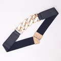 Navy elastic wide belt featuring a bold chunky gold chain link buckle for women - Gold Buckle - Navy Blue