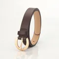 Fashionable dark brown leather belt for women featuring a polished champagne gold buckle - Coffee