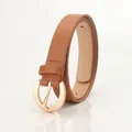 Classic slim brown leather belt for women featuring a minimalist round gold metal buckle - Camel