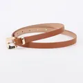 Minimalist women's thin faux leather belt in caramel brown with a gold square buckle - Camel