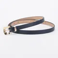 Slim dark blue leather belt for women featuring a textured golden metal pin buckle - Navy Blue