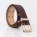 Brown leather belt with dual-row golden grommets and classic double prong buckle - Coffee