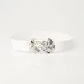 Women's white elastic waist belt featuring a silver metallic double flower buckle design - White