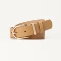 Women's light brown leather belt with gold U-shaped buckle and white stitching details - Khaki