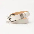 Elegant thin ivory faux leather belt for women with polished silver horseshoe buckle - White