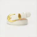 Minimalist ivory white leather belt with matte gold oval buckle and fine stitching - White