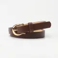 Women's minimalist dark brown leather belt with a polished golden horseshoe buckle - Coffee