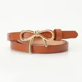 Brown leather waist belt for women with elegant golden metal bow buckle decoration - Camel