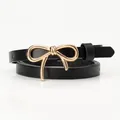 Elegant thin black leather belt for women featuring a gold butterfly bow buckle design - Black