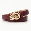 Burgundy faux leather thin belt for women featuring a gold-tone metal knot buckle - Coffee