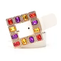 White leather belt for women featuring a gold buckle set with colorful gemstones - White