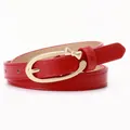 Slim red PU leather belt with a golden oval buckle and a small bow tie decoration - Red