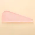 Dettaglio dell'asciugamano per capelli in microfibra rosa con morbida trama in pile - Rosa