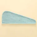 Dettaglio dell'asciugamano per capelli in pile corallo azzurro con trama assorbente - 25x65cm / Verde Turchese