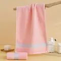 Thick pink cotton towel set with gray striped trim hanging on a wooden branch - 74cm x 34cm / Pink (Arrow Pattern)