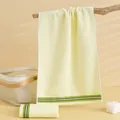 Soft light yellow cotton towel featuring stylish colorful stripes and loop texture - 72cmx33cm / Yellow