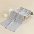 Soft light grey cotton face towel with waffle weave texture in home setting - 72x34cm / Gray Checkered
