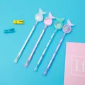 Lot de 4 stylos papillon avec globes à paillettes sur fond bleu clair - Style Paillettes Papillon