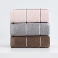 Three-pack soft cotton face towels in pink, grey and brown with striped texture - Multicolor