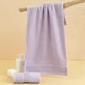 Thick light purple cotton towel set with textured stripes on warm indoor background - 74*34cm / Purple