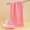 Pink absorbent cotton towel set featuring a hanging bath towel and rolled hand towel - 74*34cm / Pink