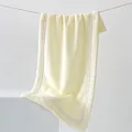 Thick coral fleece towel in light yellow featuring soft texture and premium binding - 40x80cm / Off White