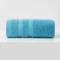 Soft absorbent 100% cotton face towel in bright turquoise blue with a ribbed texture - Standard Size / Blue
