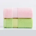 Pink and light green cotton face towels featuring classic herringbone textured patterns - 34x74cm / Pink and Green