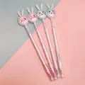 Lot de quatre stylos à paillettes lapin mignon en rose et blanc pour fournitures scolaires - Style Paillettes Lapin