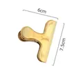 Close-up of golden stainless steel 7.5cm clip for food sealing and office documents - Gold