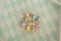 White wire macaron tray with pink bow pattern and retro candy illustration design - Candy