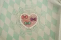 Pink heart-shaped PVC coaster with white polka dots and colorful ribbon bows - Heart with Bow