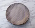 Artistic mauve ceramic dinner plate with vertical embossed texture and brown trim edges - Type D Minimum Order Of 2 Pieces Per Type