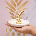 Golden bunny ceramic jewelry dish for rings and earrings shown in a hand - Gold Rabbit White Tray