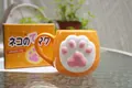 Simpatica tazza in ceramica arancione con zampa di gatto 3D e confezione originale - Tazza Zampa di Gatto Arancione
